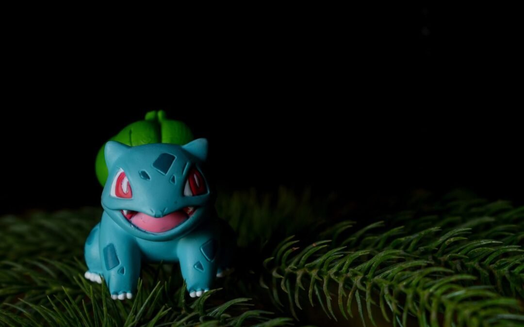 Vibrant Bulbasaur toy placed on pine needles with a dark background.